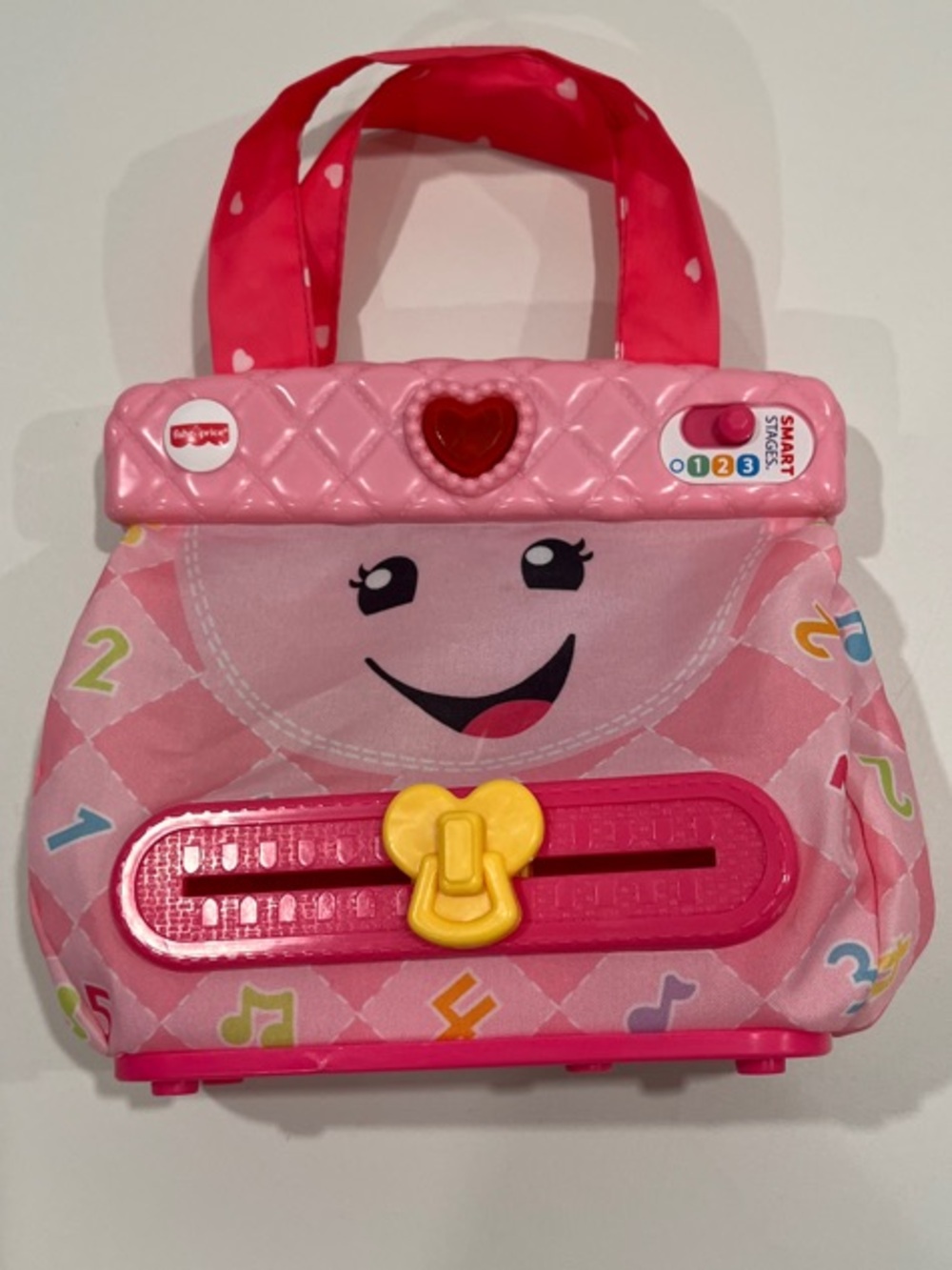 Fisher-Price Pink Musical Learning Purse Toy